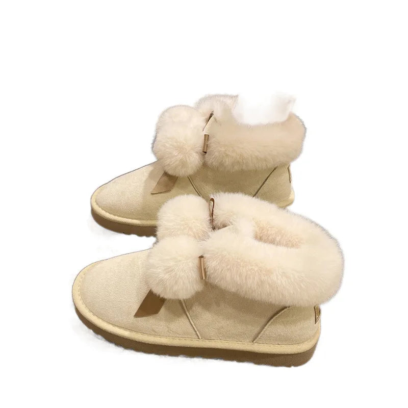 Snow boots women's autumn and winter 2025 explosion new cute hairball piled thickened bread shoes warm cotton shoes