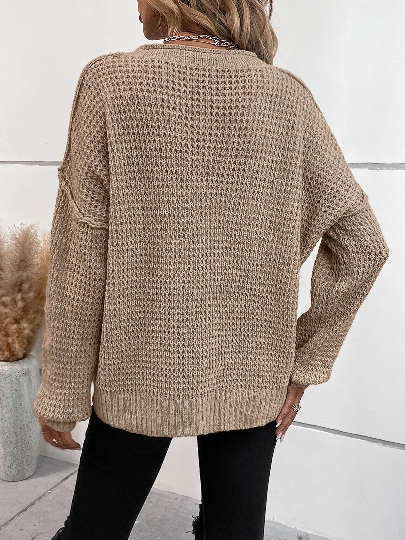 Autumn and winter new button V-neck pullover long sleeved knitted sweater