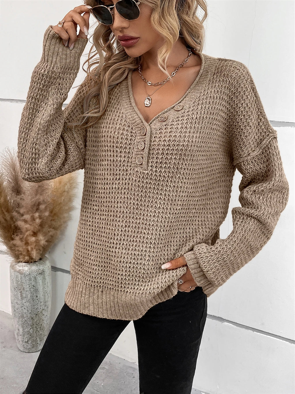 Autumn and winter new button V-neck pullover long sleeved knitted sweater